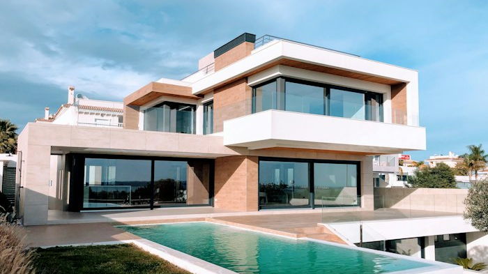 Contemporary villa with a swimming pool, used as a reference for project supply.
